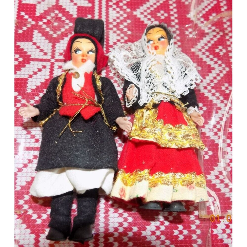 Pair of vintage world dolls couple still on original plastic